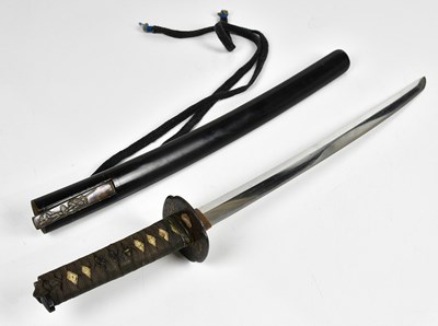 Lot 660 - A Japanese Wakizashi sword, the shagreen grip...