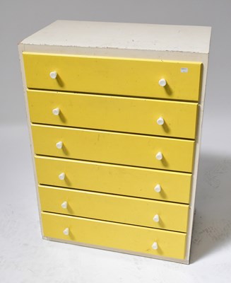 Lot 23 - A mid-20th century chest of six long drawers...