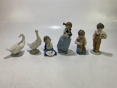 Lot 1704 - Six ceramics figures, to include 01127 'Boy...