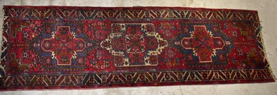 Lot 1442 - A large Eastern runner, the central elephant...