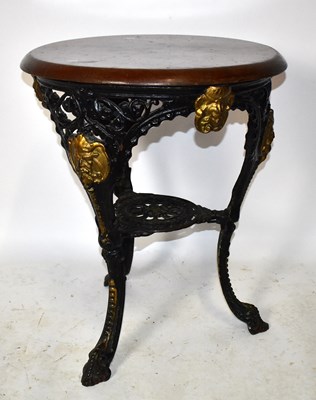Lot 1418 - A cast iron black and gilt painted Britannia...