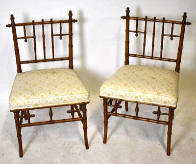 Lot 1559 - A pair of Aesthetic style simulated bamboo...