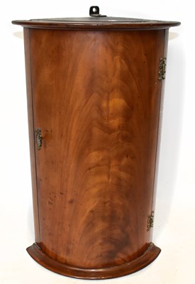 Lot 1742 - A reproduction small mahogany bowfront hanging...