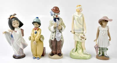Lot 1724 - LLADRO; four ceramic figures, three examples...