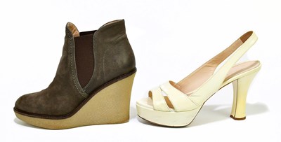 Lot 800 - EMPORIO ARMANI; a pair of brown suede wedge...