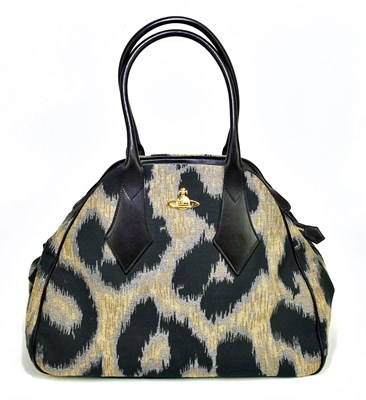 Lot 728 - VIVIENNE WESTWOOD; a black, gold and silver...