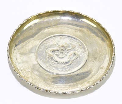 Lot 1361 - A Chinese silver pin dish with cast rim with...