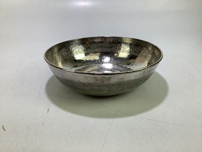 Lot 1073A - An Eastern white metal bowl of circular form,...