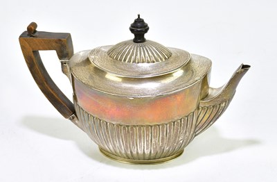 Lot 1049 - A Victorian hallmarked silver teapot of oval...