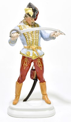 Lot 1409 - HEREND; a large ceramic figure of a soldier...