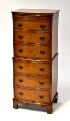 Lot 27 - A reproduction walnut veneered small chest-on-chest