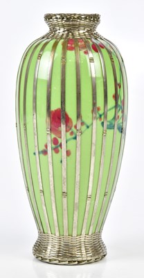 Lot 1164 - A Japanese white metal mounted vase with...