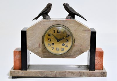 Lot 2267 - An Art Deco slate and marble mantel clock,...