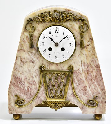 Lot 2268 - A French Art Deco mantel clock with arched top,...