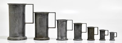 Lot 1126 - A graduated set of French pewter measures.
