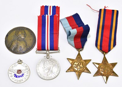 Lot 493 - A three piece WWII medal group comprising 1939-...