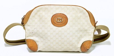 Lot 697 - GUCCI; a 1980s vintage monogram coated canvas...