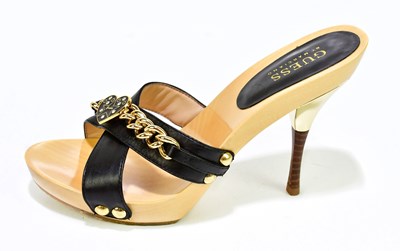 Lot 806 - GUESS; a pair of unused black leather stiletto...
