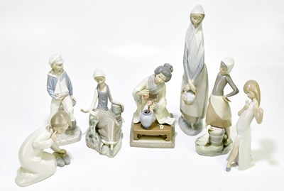 Lot 1729 - LLADRO; six figures to include a maiden...