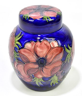 Lot 1773 - MOORCROFT; a ginger jar and cover decorated in...