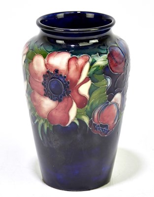 Lot 1782 - WALTER MOORCROFT; a vase decorated in 'Anemone'...