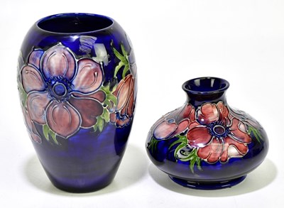 Lot 1783 - MOORCROFT; two vases decorated in 'Anemone'...