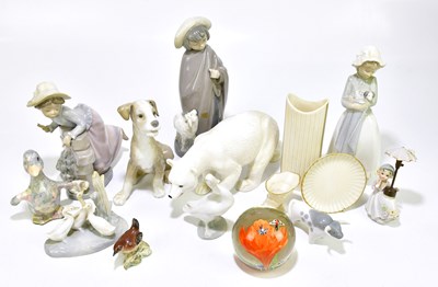 Lot 1730 - LLADRO; a model of a seated dog, height 19cm,...