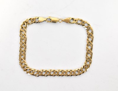 Lot 919 - A 9ct gold double link bracelet