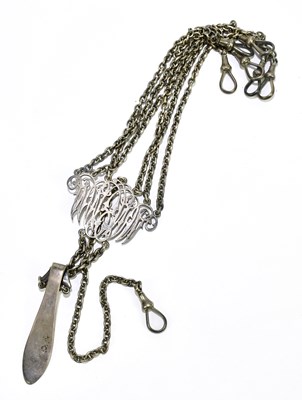 Lot 1281 - A Victorian white metal chatelaine with seven...