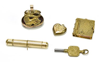 Lot 2083 - W.S. NICKS; a yellow metal pull-out propelling...