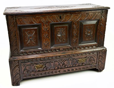 Lot 2345 - An 18th century miniature carved oak coffer,...