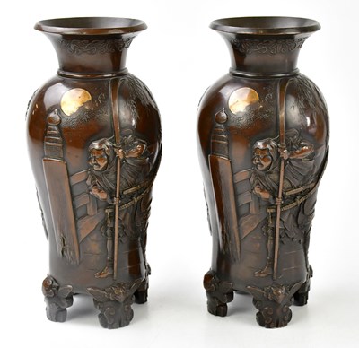 Lot 1819 - A pair of Japanese bronze vases, relief...