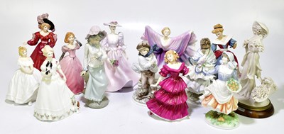 Lot 1742 - ROYAL DOULTON; a collection of seven figures...