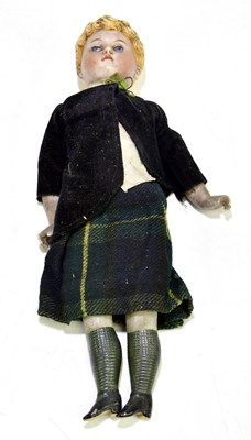 Lot 2041 - An unusual German bisque headed doll modelled...