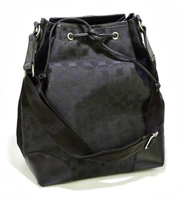 Lot 716 - AQUASCUTUM; a black textured canvas shoulder...