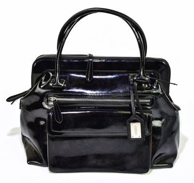 Lot 714 - BASLER; a large black patent leather handbag...