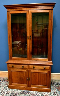 Lot 2356 - An Edwardian walnut bookcase with glazed upper...