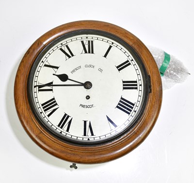 Lot 2290 - A circa 1900 oak circular wall clock with...