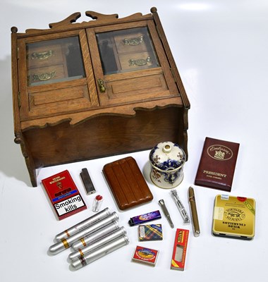 Lot 1086 - An Edwardian oak smoker's cabinet and a small...