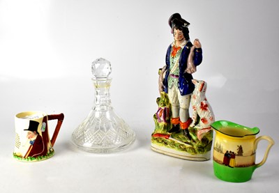 Lot 248 - A Staffordshire flatback figure of a huntsman holding a pair of hares