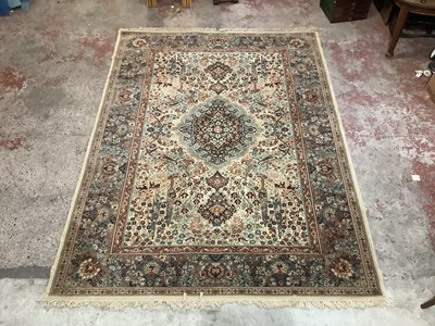 Lot 2286 - A large rug with stylised landscape and floral...