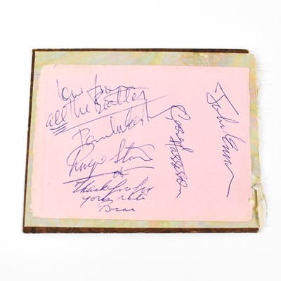 Lot 246 - THE BEATLES; a torn page from an autograph...