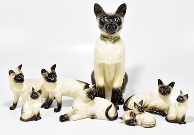 Lot 708 - A model of a fireside Siamese cat, numbered...