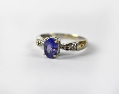 Lot 1015 - An 18ct white gold dress ring