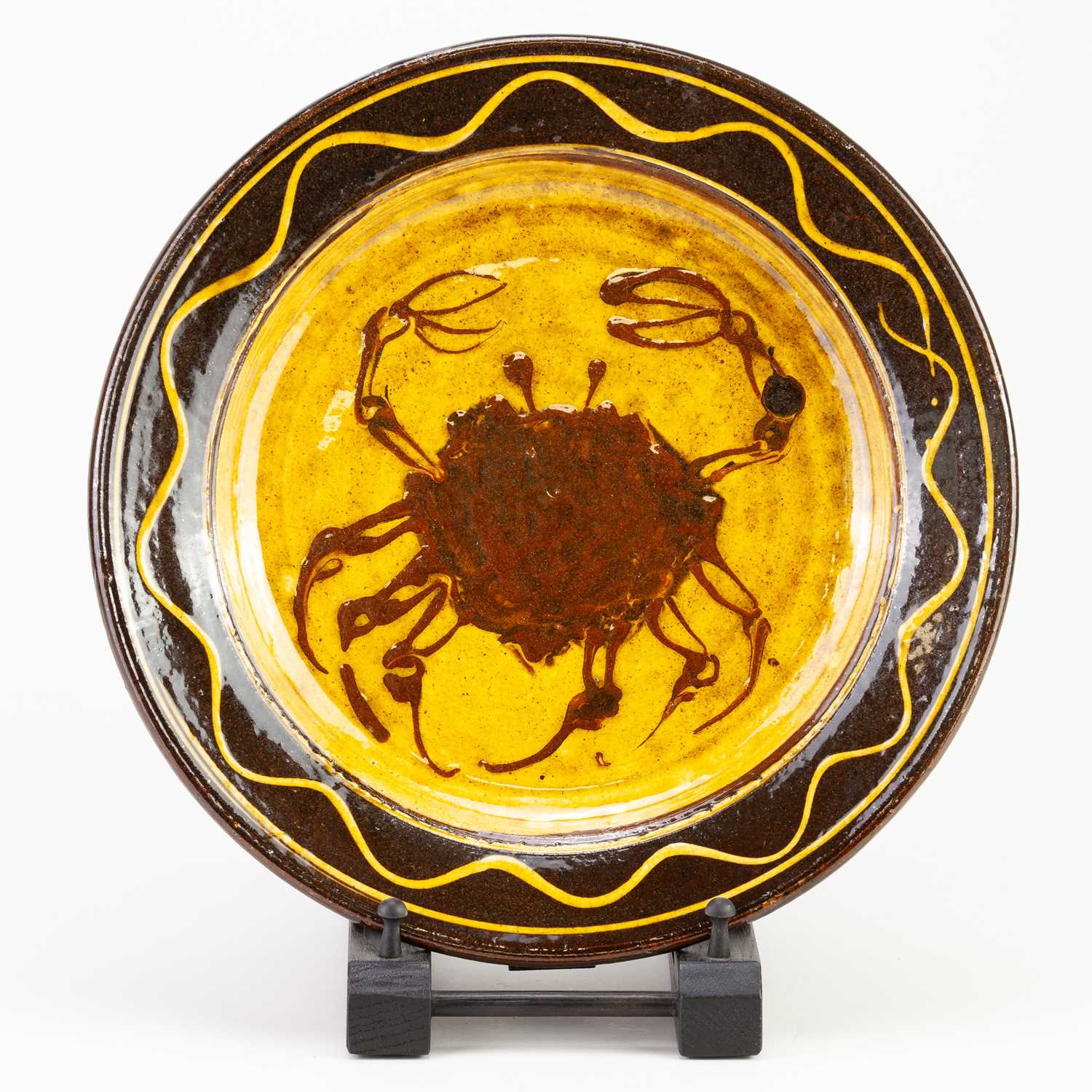 Lot 10 - CLIVE BOWEN (born 1943); a slipware dish...