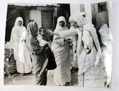 Lot 565 - MOTHER THERESA; a black and white photograph...