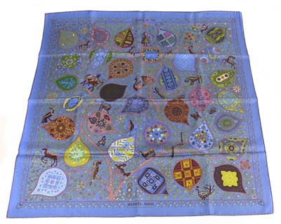 Lot 745 - HERMÈS; a 100% silk blue, pink, green and gold...