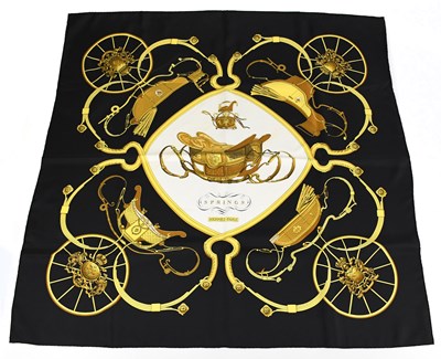 Lot 746 - HERMÈS; a 100% silk black, gold and white...