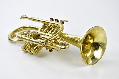 Lot 1330 - F. BESSON; an early 20th century brass cornet.