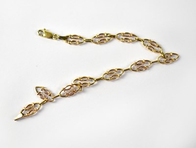 Lot 915 - A 9ct gold fancy open oval link bracelet